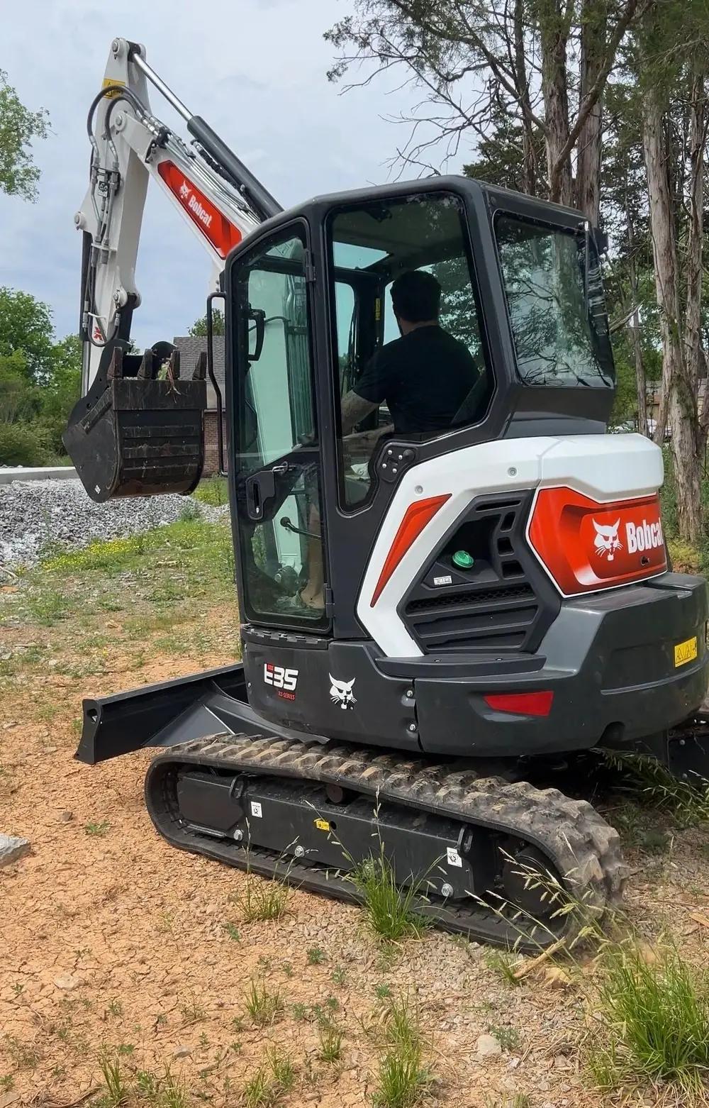 Black Sheep Builders’ Bobcat mini excavator on a job site